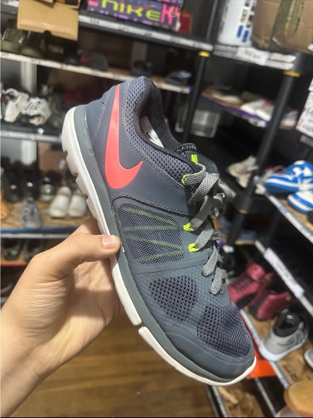 Nike Gray Training Shoe with Pink Swoosh and Neon Accents